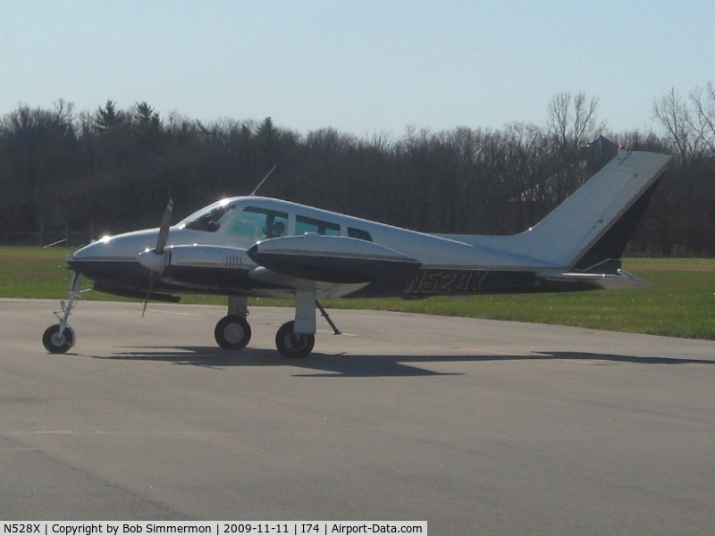 N528X, 1961 Cessna 310F C/N 310-0128, On the ramp at Urbana, Ohio