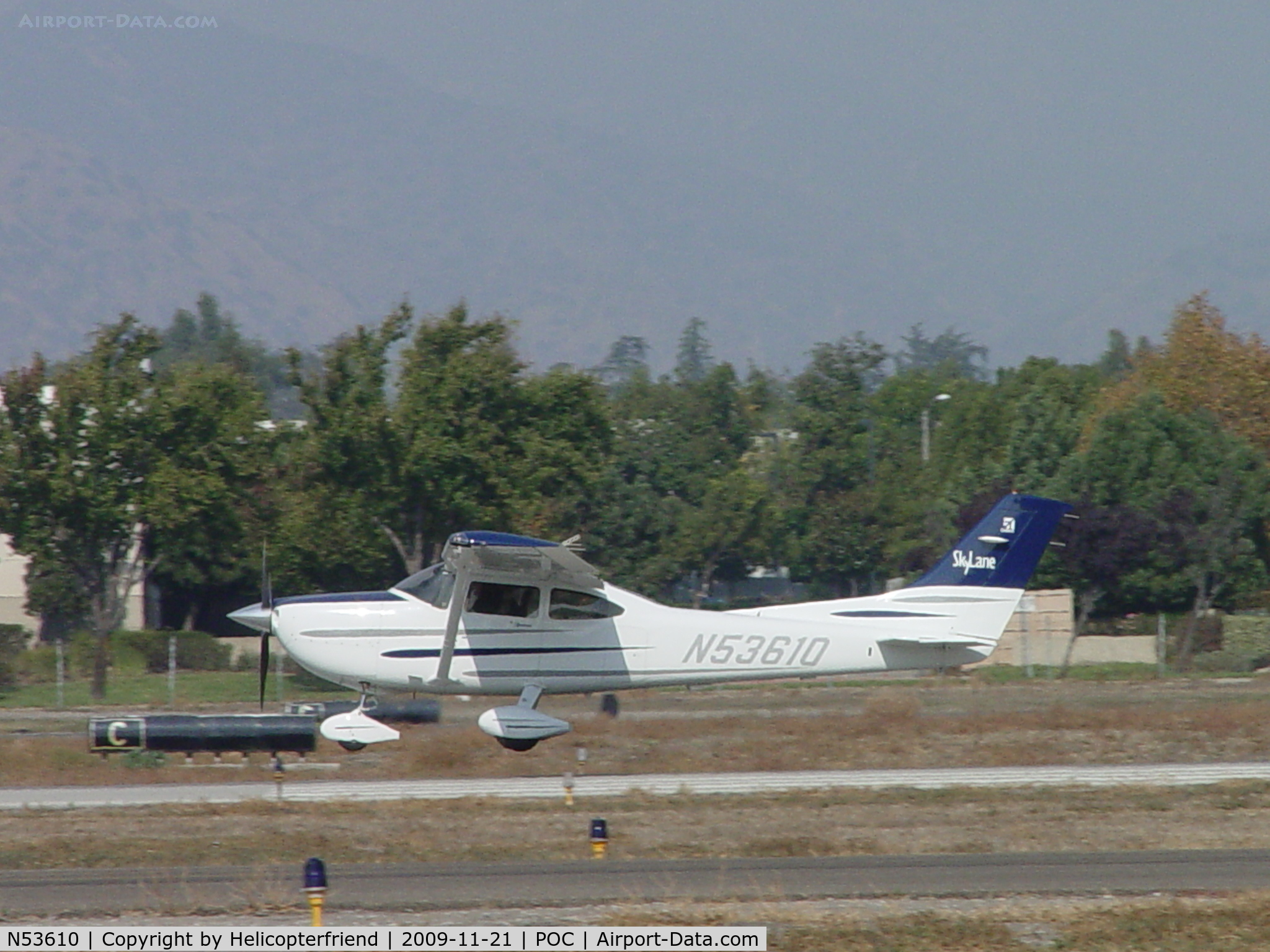 N53610, 2003 Cessna 182T Skylane C/N 18281223, Lifting off westbound from 26L