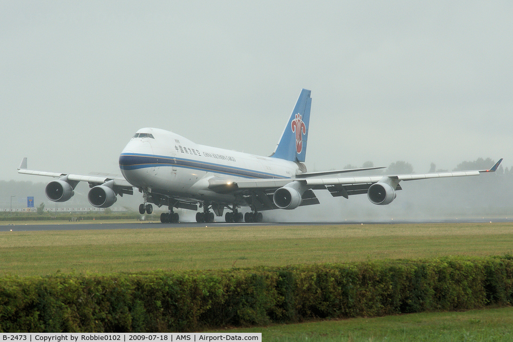 B-2473, 2002 Boeing 747-41BF/SCD C/N 32803, rainy day at AMS