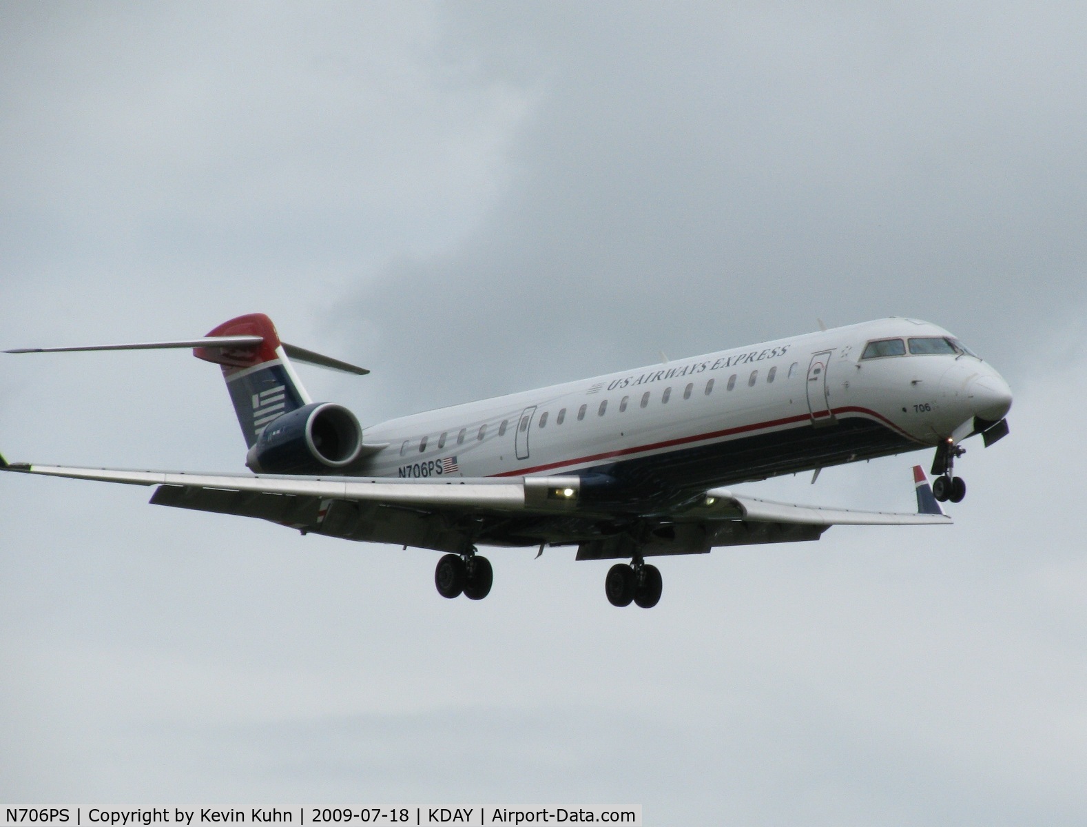 N706PS, 2004 Bombardier CRJ-701 (CL-600-2C10) Regional Jet C/N 10150, Normal traffic keeps on plugging even as the airshow goes on (CRJ-700)