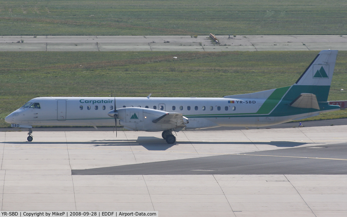 YR-SBD, 1993 Saab 2000 C/N 2000-004, Taxiing to remote parking across from T2.
