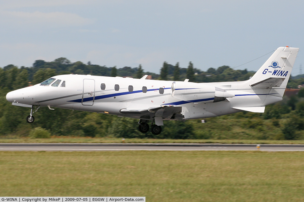 G-WINA, 2003 Cessna 560XL Citation Excel C/N 560-5343, Just about to touchdown on Runway 26.