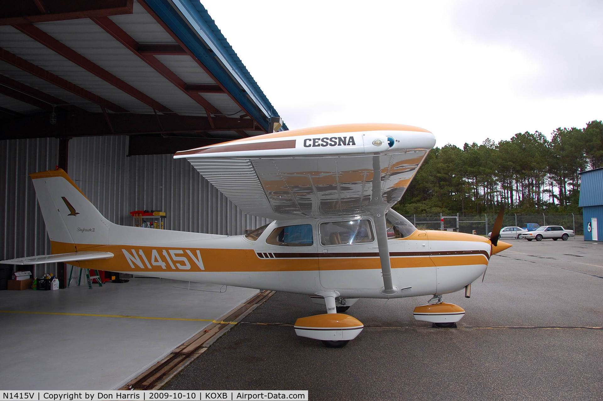 N1415V, 1974 Cessna 172M C/N 17263560, Outside of hangar, getting new wingtip strobes installed
