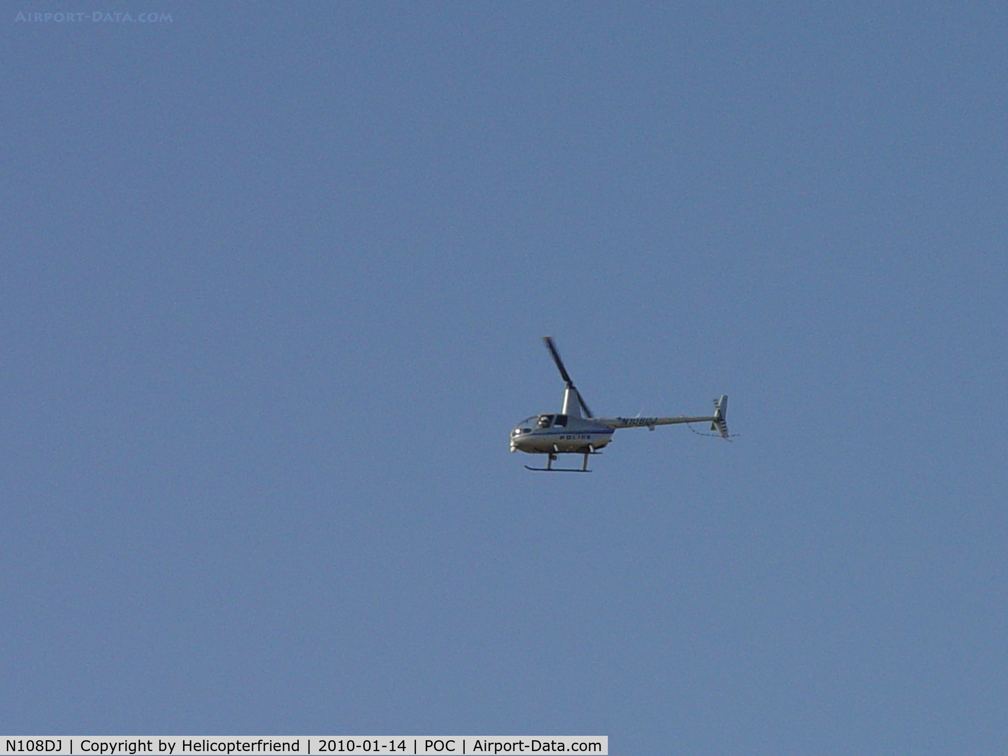 N108DJ, 2001 Robinson R44 C/N 1060, El Monte PD flying southwest over Brackett