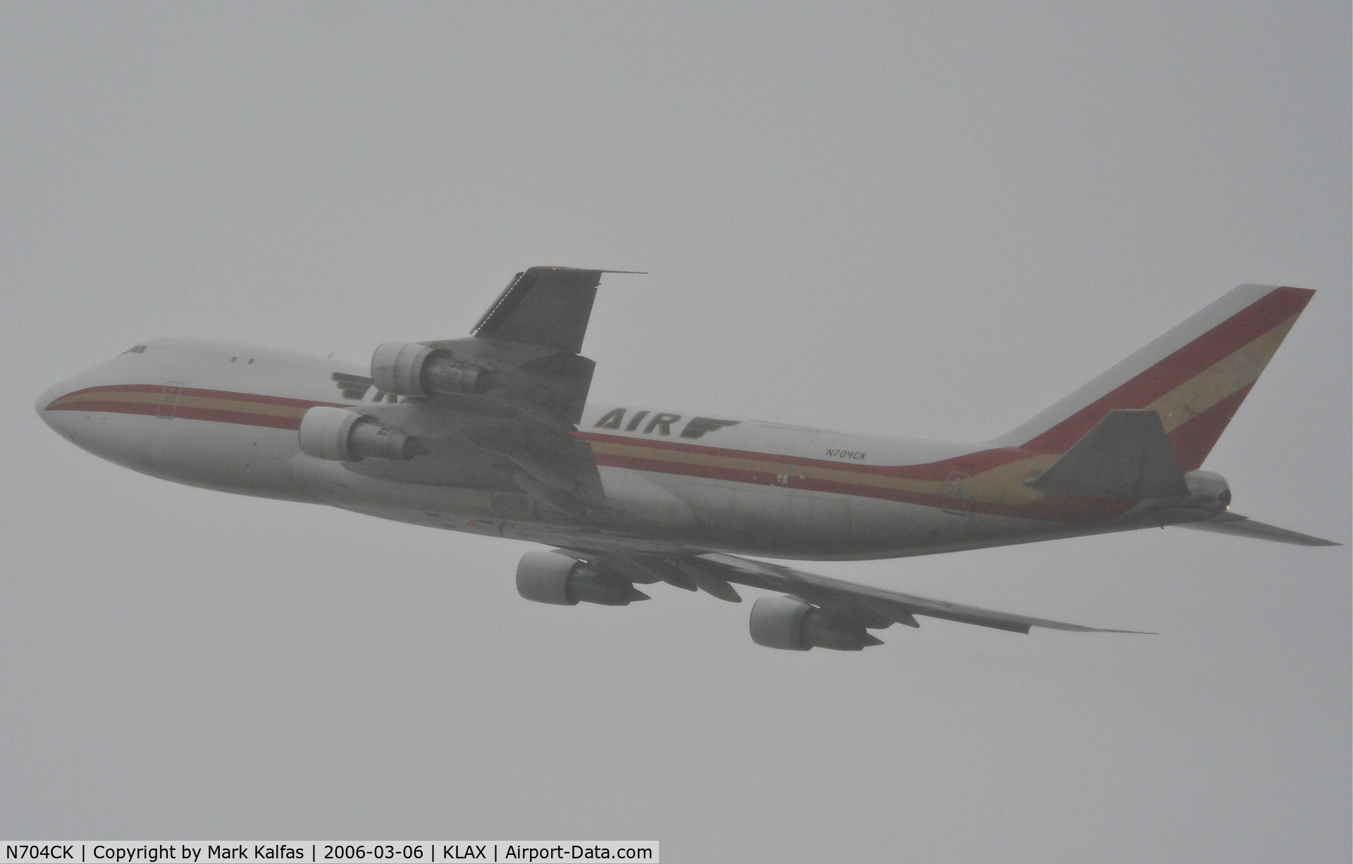 N704CK, 1980 Boeing 747-209F C/N 22299, Kalitta Air Boeing 747-209F, blasting through the fog, 25L departure KLAX.