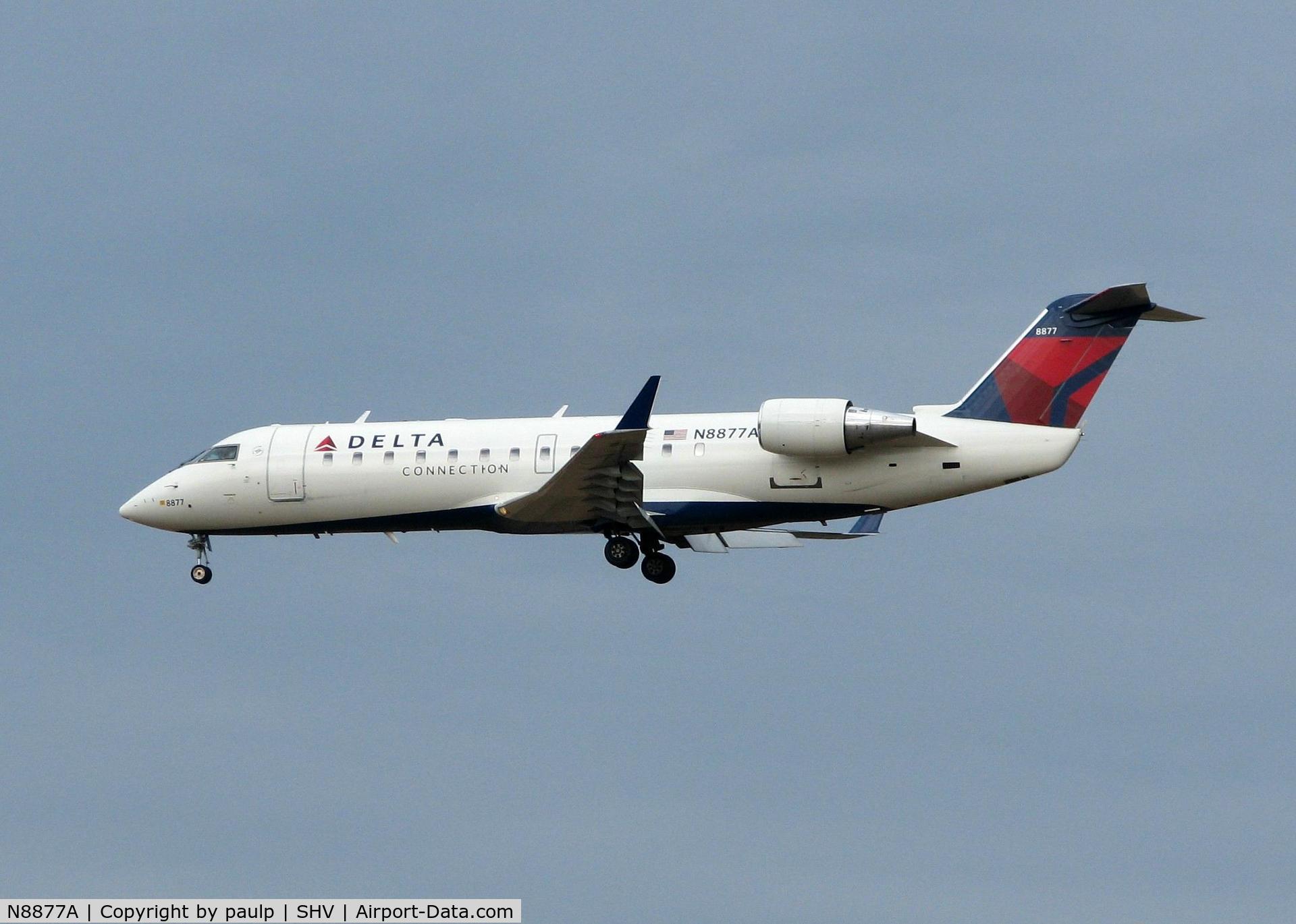 N8877A, 2003 Bombardier CRJ-440 (CL-600-2B19) C/N 7877, Landing on 23 at Shreveport Regional.