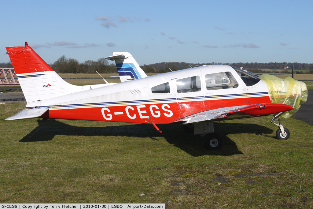 G-CEGS, 1978 Piper PA-28-161 Cherokee Warrior II C/N 28-7816418, Part of a busy aviation scene at Wolverhampton (Halfpenny Green) Airport on a crisp winters day