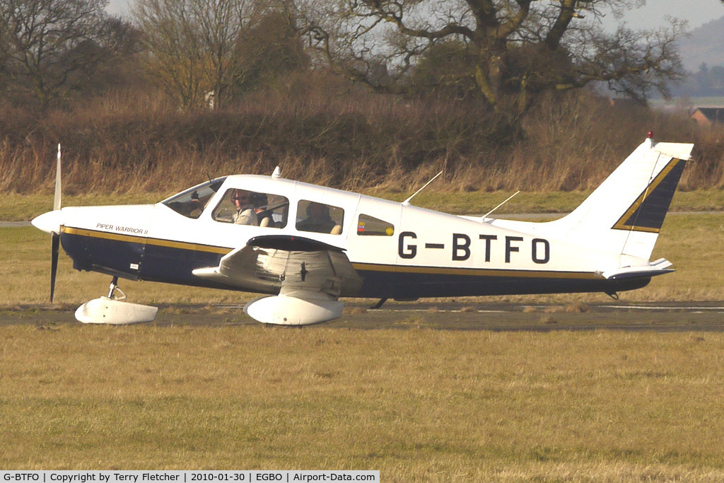 G-BTFO, 1978 Piper PA-28-161 Cherokee Warrior II C/N 28-7816580, Part of a busy aviation scene at Wolverhampton (Halfpenny Green) Airport on a crisp winters day