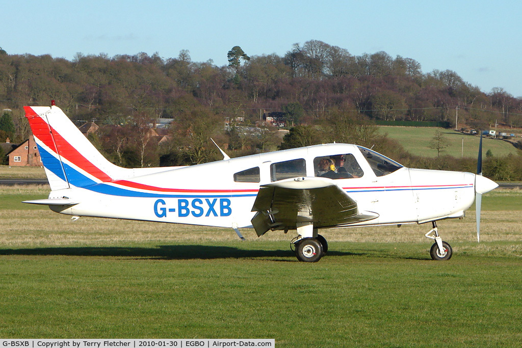 G-BSXB, 1984 Piper PA-28-161 Cherokee Warrior II C/N 28-8416125, Part of a busy aviation scene at Wolverhampton (Halfpenny Green) Airport on a crisp winters day