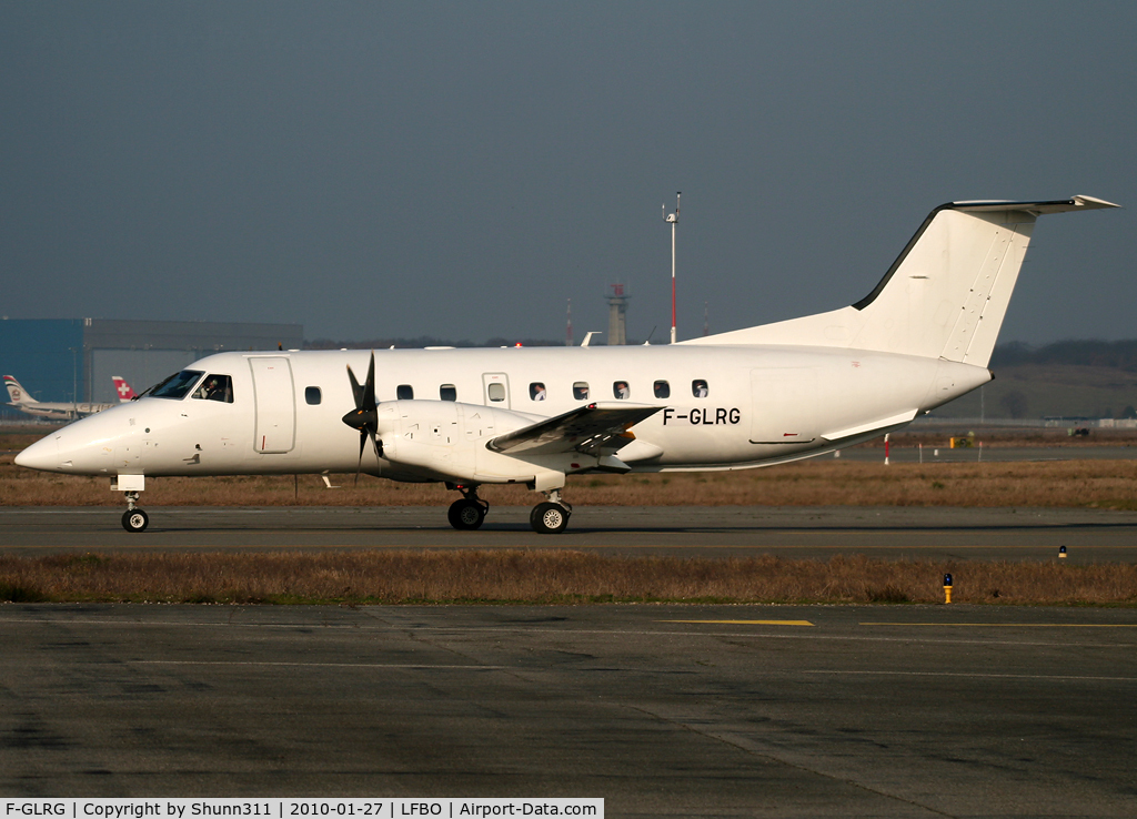 F-GLRG, 1989 Embraer EMB-120ER Brasilia C/N 120149, Taxiing holding point rwy 32L... Used as a private owner named Aelis Air Service now...