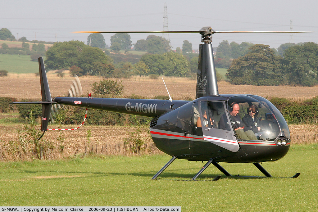 G-MGWI, 2000 Robinson R44 Astro C/N 0663, Robinson R-44 Astro at Fishburn Airfield in 2006.