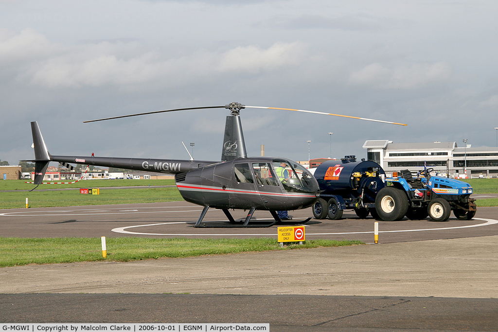 G-MGWI, 2000 Robinson R44 Astro C/N 0663, Robinson R-44 Astro refuelling at Leeds Bradford Airport in 2006