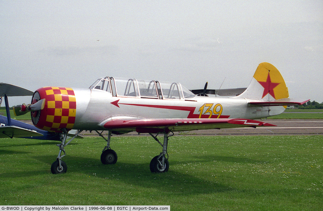 G-BWOD, 1983 Bacau Yak-52 C/N 833810, Bacau Yak-52. At Cranfield's celebration of the 50th anniversary of the College of Aeronautics in 1996.