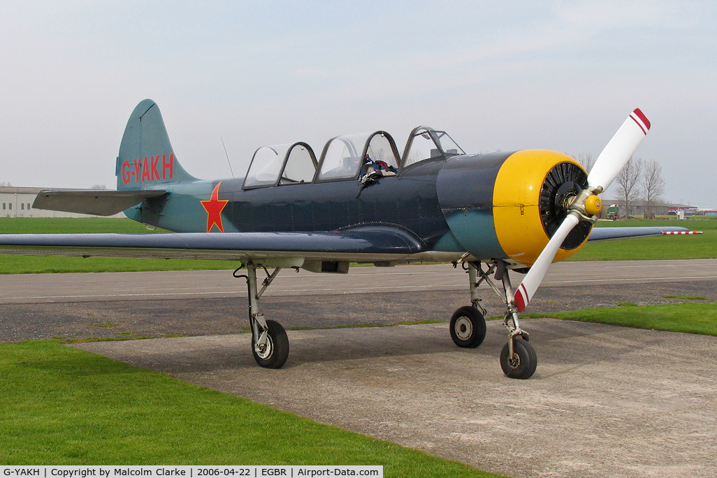 G-YAKH, 1989 Bacau Yak-52 C/N 899915, Bacau Yak-52. At Breighton Airfield in 2006. Previously registered as RA-01948.