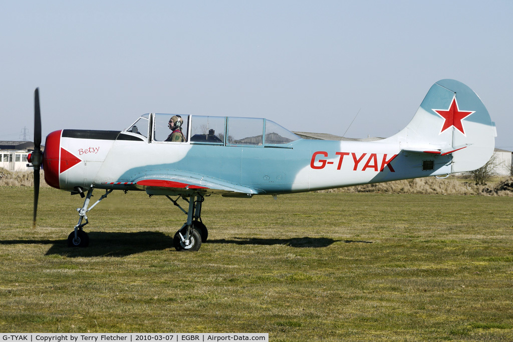 G-TYAK, 1989 Bacau Yak-52 C/N 899907, 1989 Intreprinderea De Avioane Bacau YAK-52 - One of the many aircraft at Breighton on a fine Spring morning