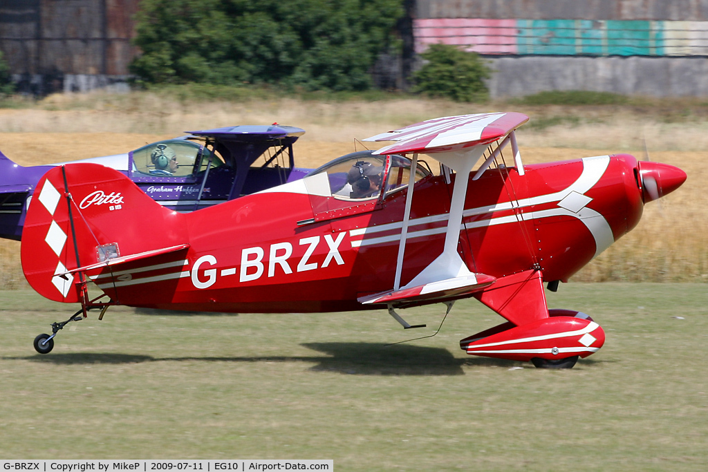 G-BRZX, 1984 Pitts S-1S Special C/N 711-H, Departing in formation from Runway 11.
