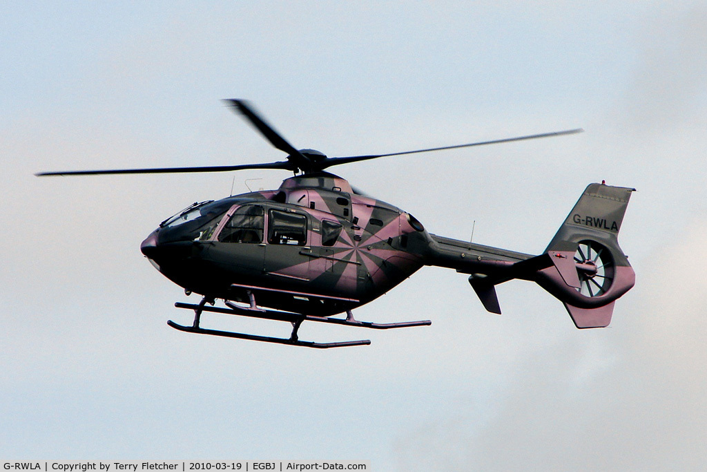 G-RWLA, 2007 Eurocopter EC-135T-2+ C/N 0635, The pink version of the iridescent colour scheme on this EC135T2+ at Gloucestershire (Staverton) Airport