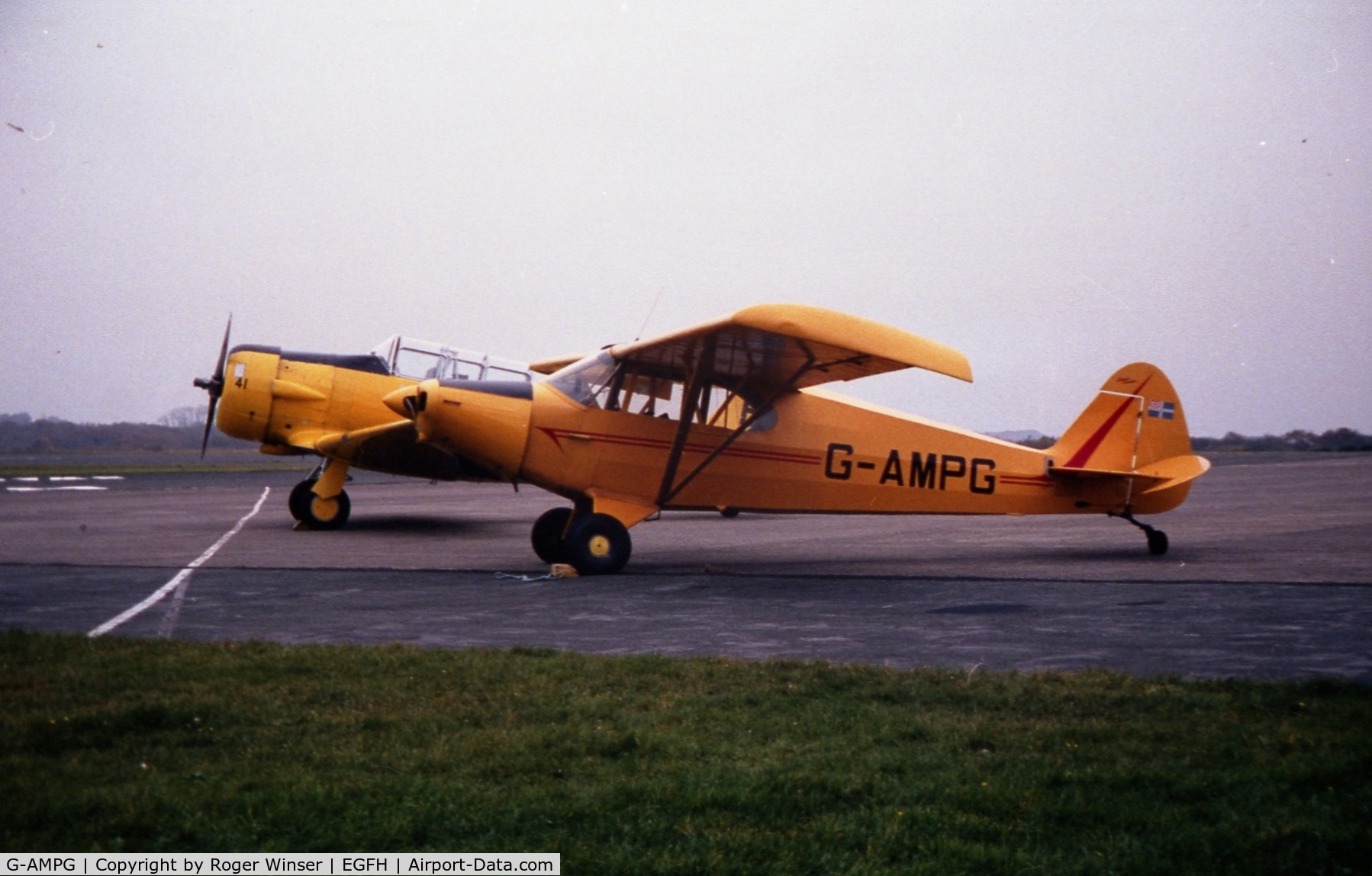 G-AMPG, 1946 Piper PA-12 Super Cruiser C/N 12-985, Visiting PA-12 with Harvard G-DDMV. Mid-1990's