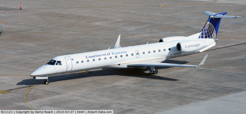 N11121, 2003 Embraer ERJ-145XR (EMB-145XR) C/N 145683, ERJ parks at the gate.