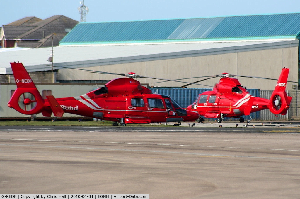 G-REDF, 2009 Eurocopter AS-365N-3 Dauphin 2 C/N 6884, with G-REDE, Bond Helicopters