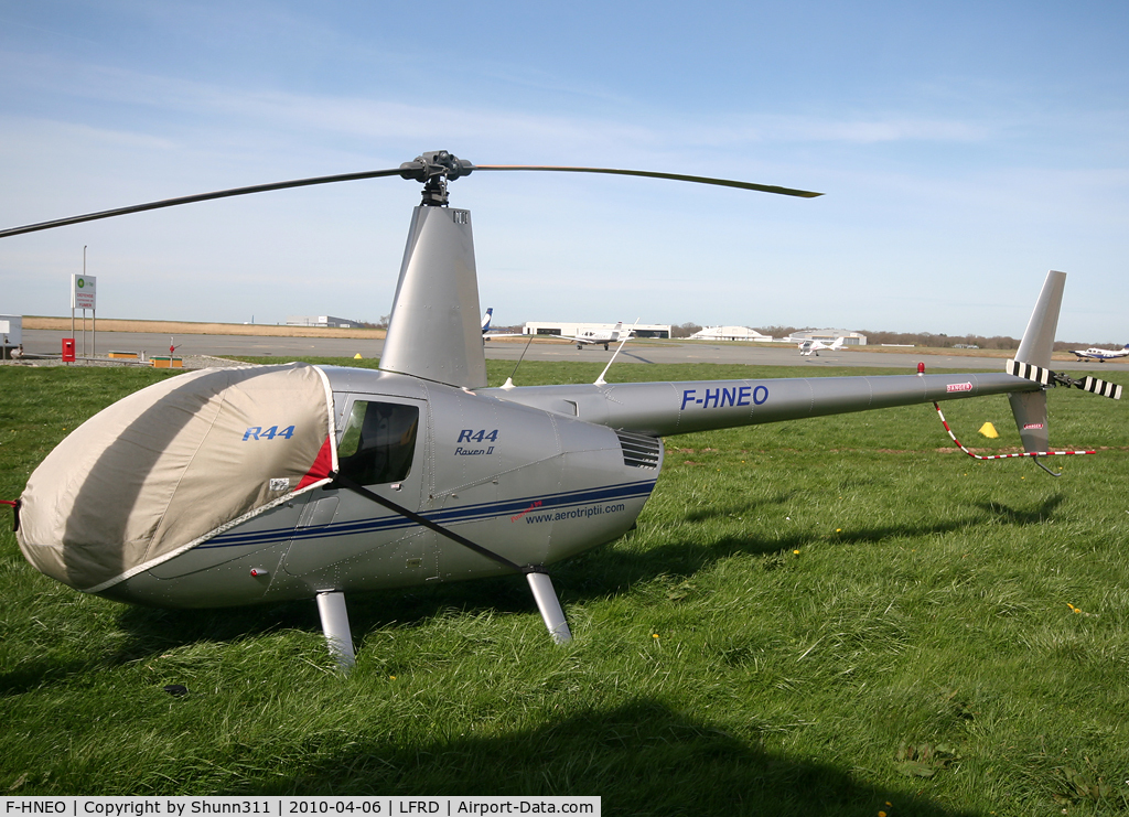 F-HNEO, Robinson R44 Raven II C/N 10583, Parked in the grass...