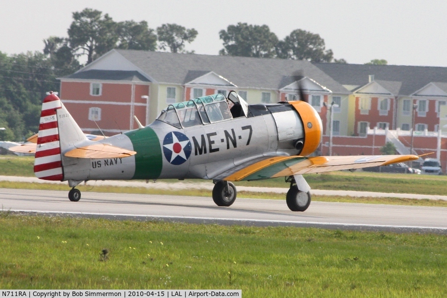 N711RA, 1943 North American SNJ-5C Texan Texan C/N 88-14800, Departing Lakeland, FL during Sun N Fun 2010