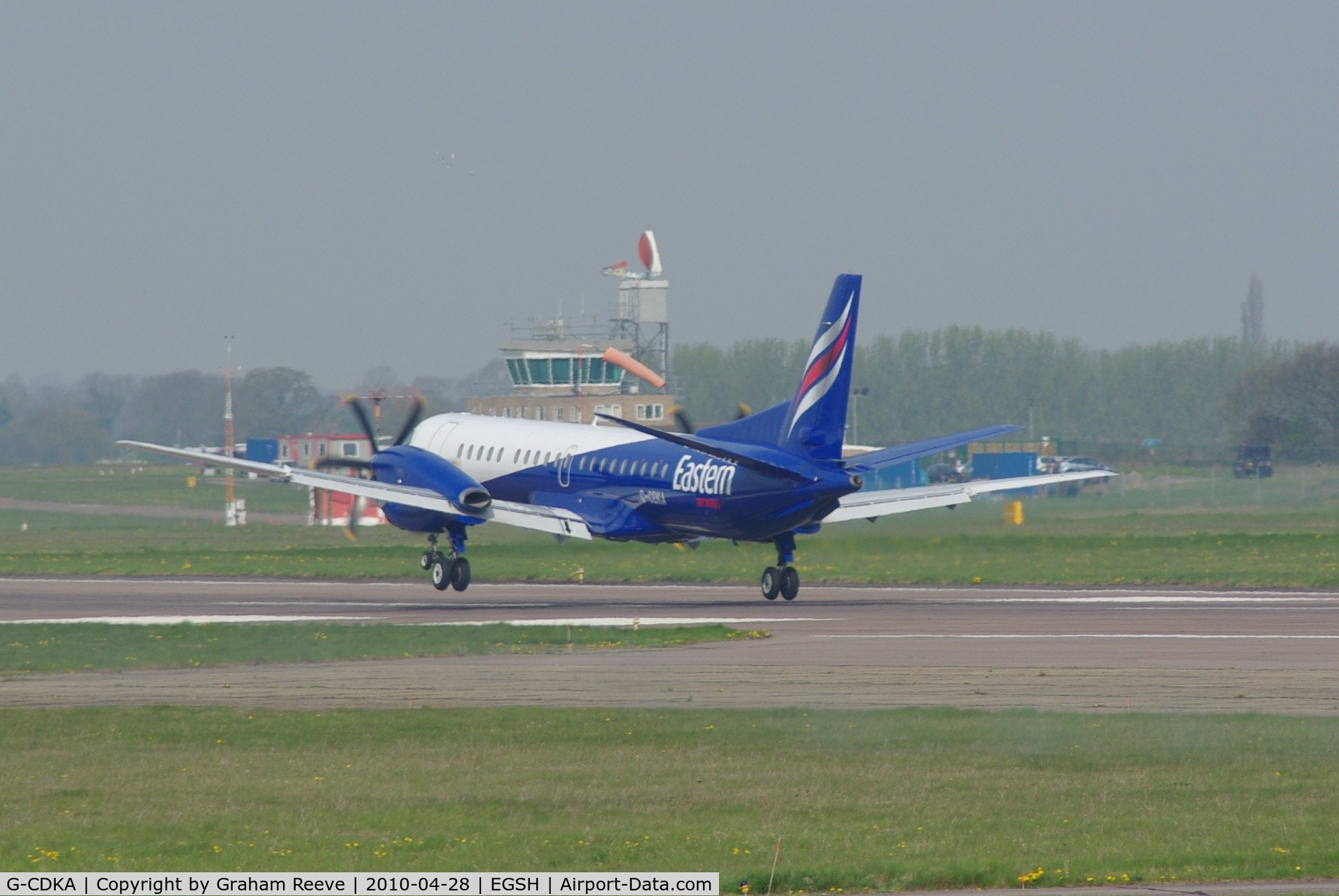 G-CDKA, 1993 Saab 2000 C/N 2000-006, Landing at Norwich.
