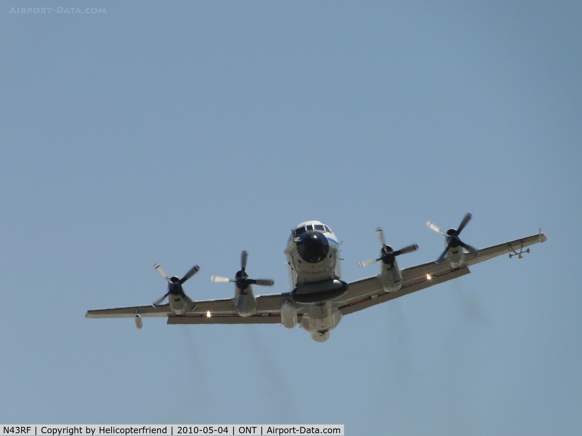 N43RF, Lockheed WP-3D Orion C/N 285A-5633, Appears to be smiling after lifting off from runway 26L