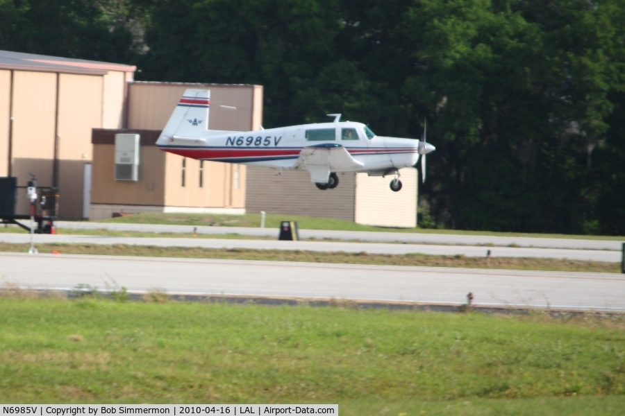 N6985V, 1976 Mooney M20F Executive C/N 22-1347, Arriving at Lakeland, FL during Sun N Fun 2010.