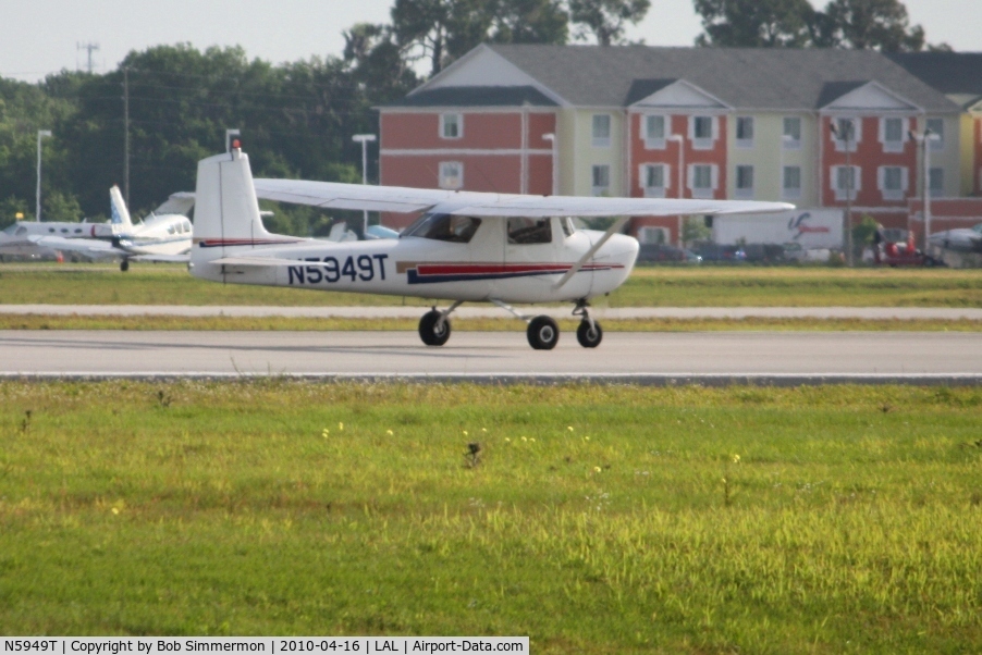 N5949T, 1964 Cessna 150D C/N 15060649, Departing Lakeland, FL during Sun N Fun 2010