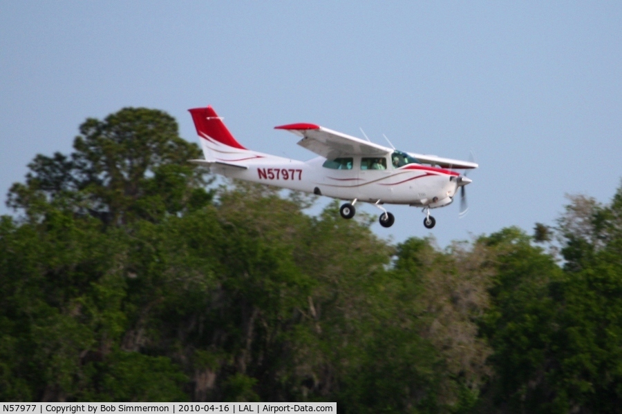 N57977, 1976 Cessna T210L Turbo Centurion C/N 21061475, Arriving at Lakeland, FL during Sun N Fun 2010.