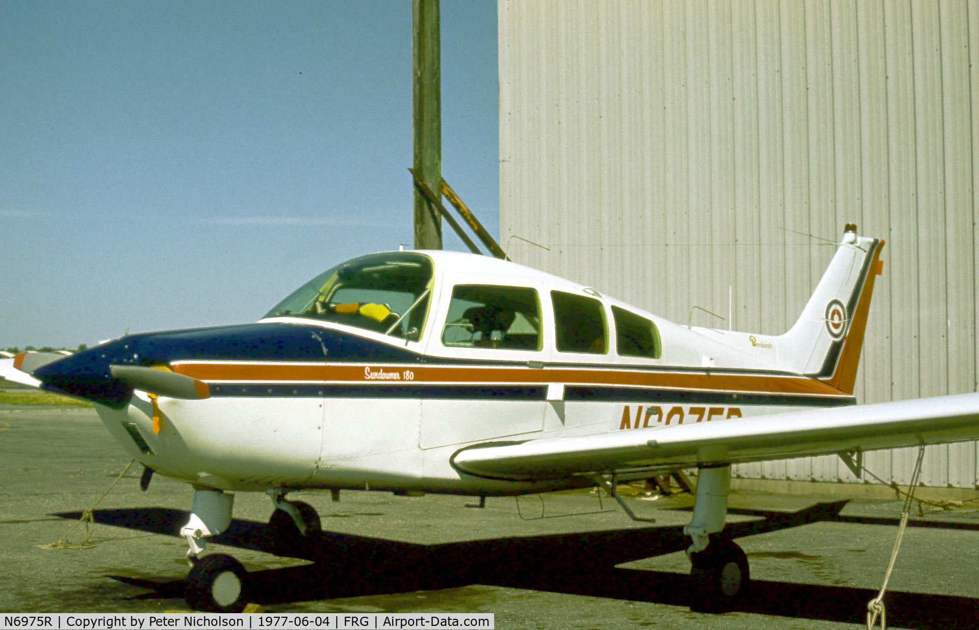 N6975R, Beech C23 Sundowner 180 C/N M-1586, Beech C23 Sundowner 180 resident at Republic Airport on Long Island in the Summer of 1977.