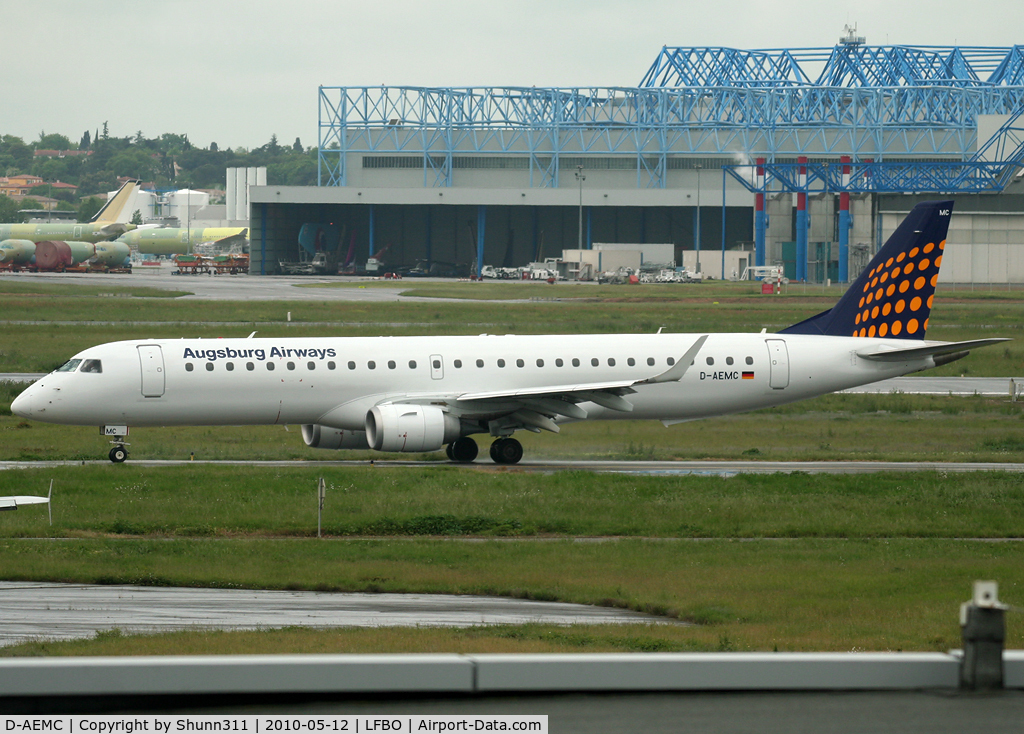 D-AEMC, 2009 Embraer 195LR (ERJ-190-200LR) C/N 19000300, Taxiing holding point rwy 32R for departure...