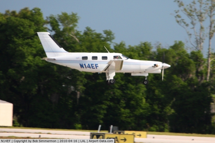 N14EF, 1988 Piper PA-46-350P Malibu Mirage C/N 4622009, Arriving at Lakeland, FL during Sun N Fun 2010.