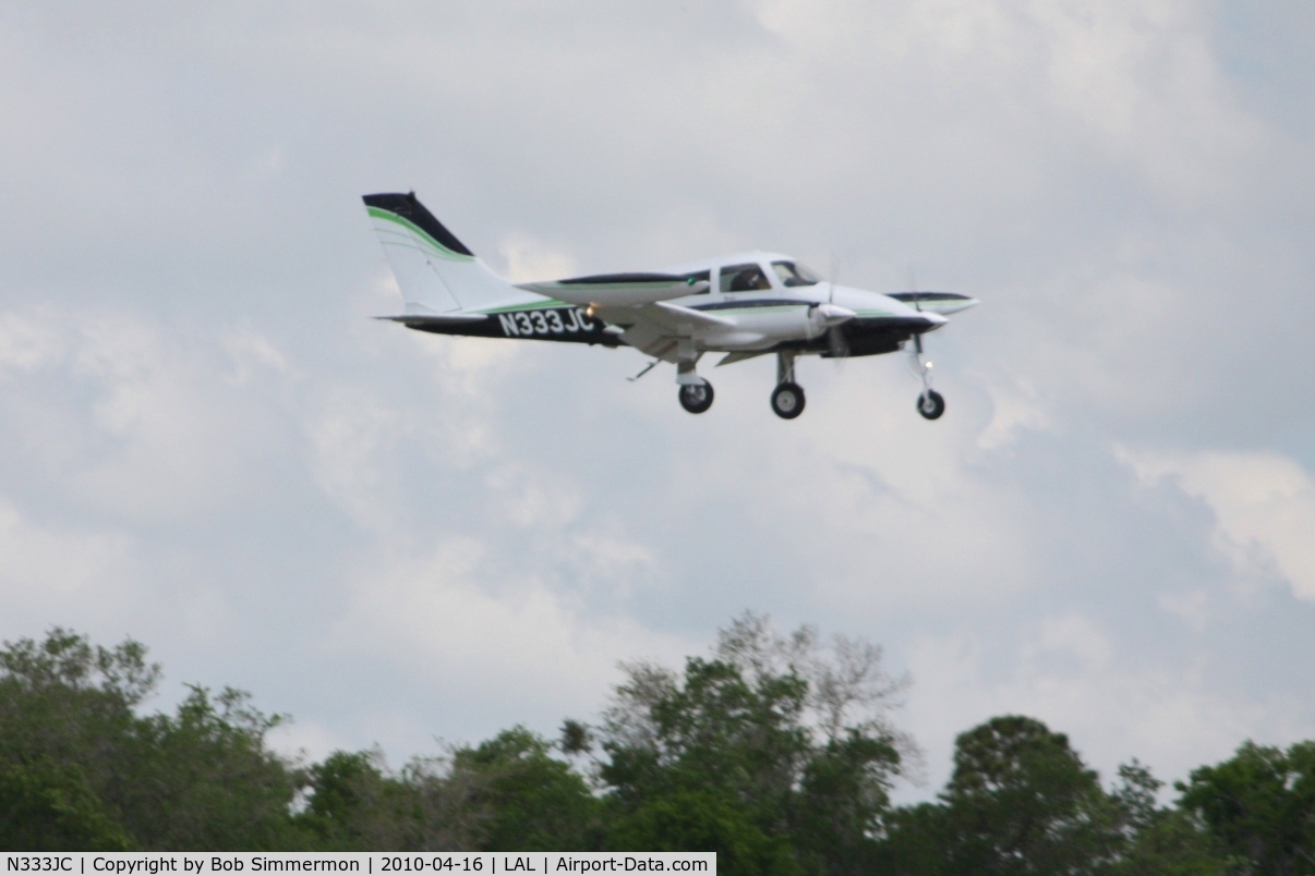 N333JC, 1967 Cessna 310L C/N 310L-0197, Arriving at Lakeland, FL during Sun N Fun 2010.