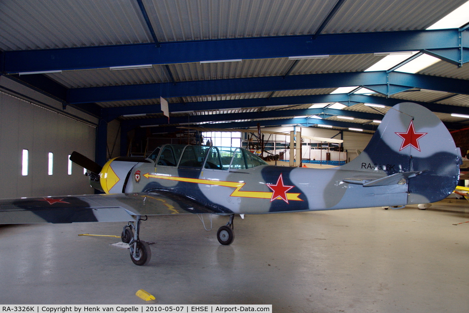 RA-3326K, 1987 Bacau Yak-52 C/N 877401, Yak-52 parked in the Flying Museum at Seppe airfield, the Netherlands.