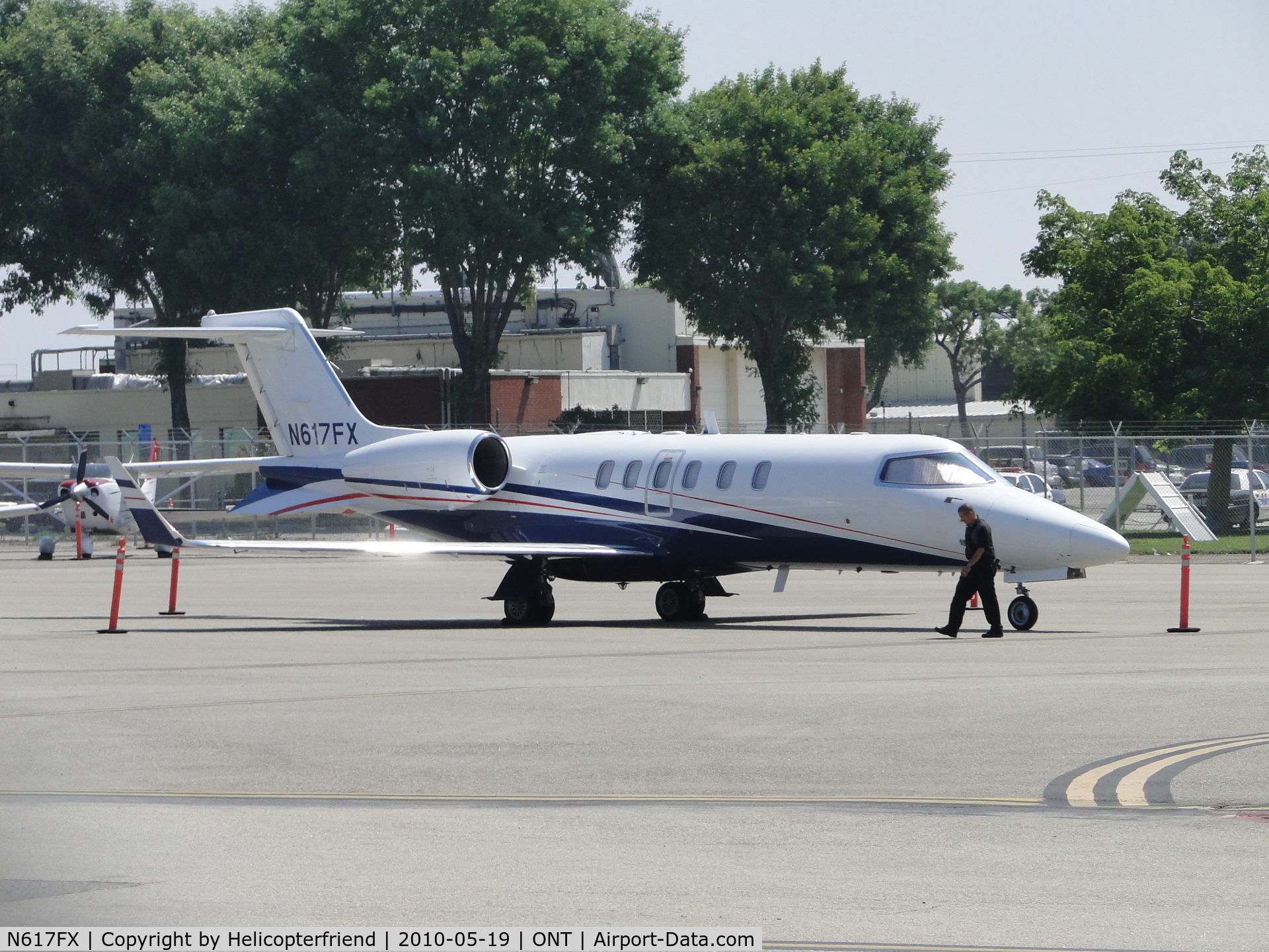 N617FX, 2006 Learjet Inc 45 C/N 2065, Parked at Ontario, and no he's not kicking the tires