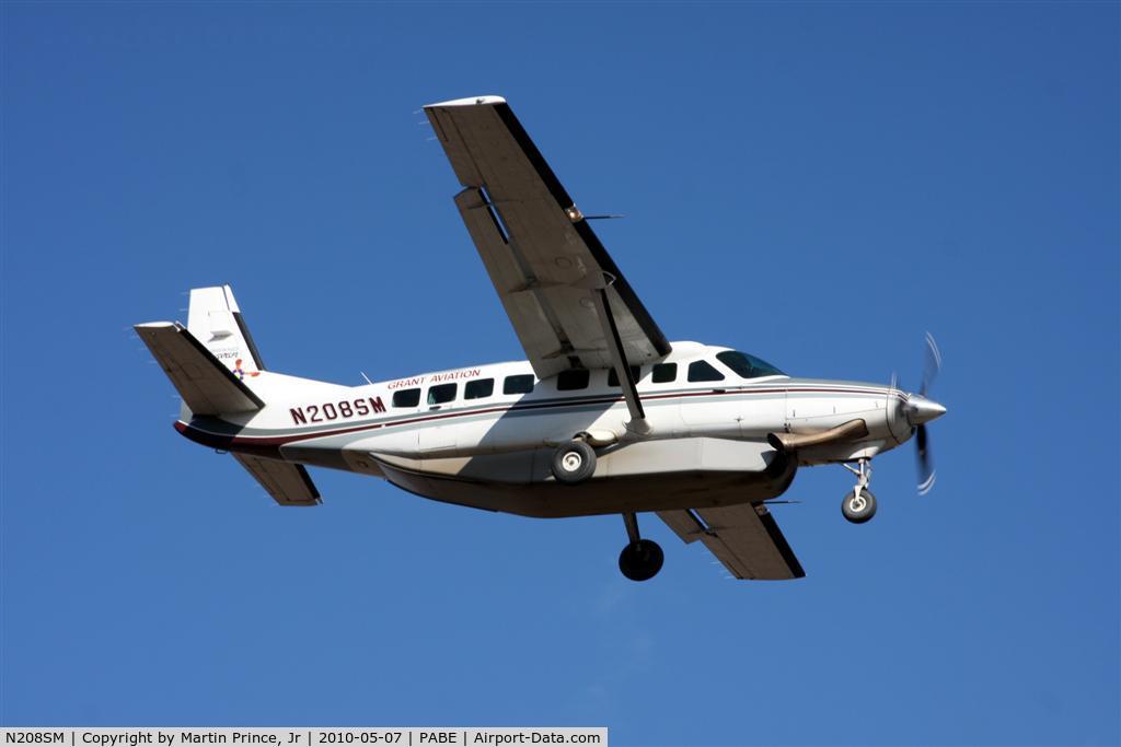 N208SM, 1999 Cessna 208B Grand Caravan C/N 208B-0749, Grant Air Cessna 208 landing runway 18