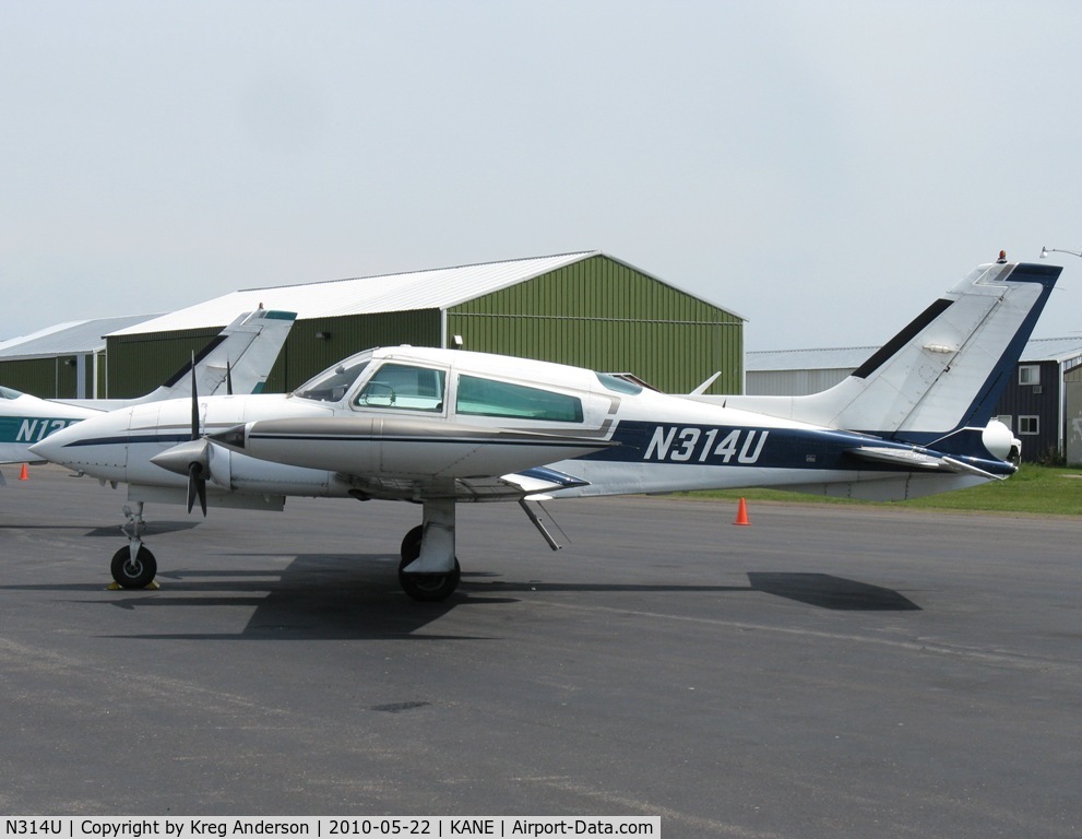 N314U, 1979 Cessna 310R C/N 310R1852, Parked on a ramp by one of the FBOs.