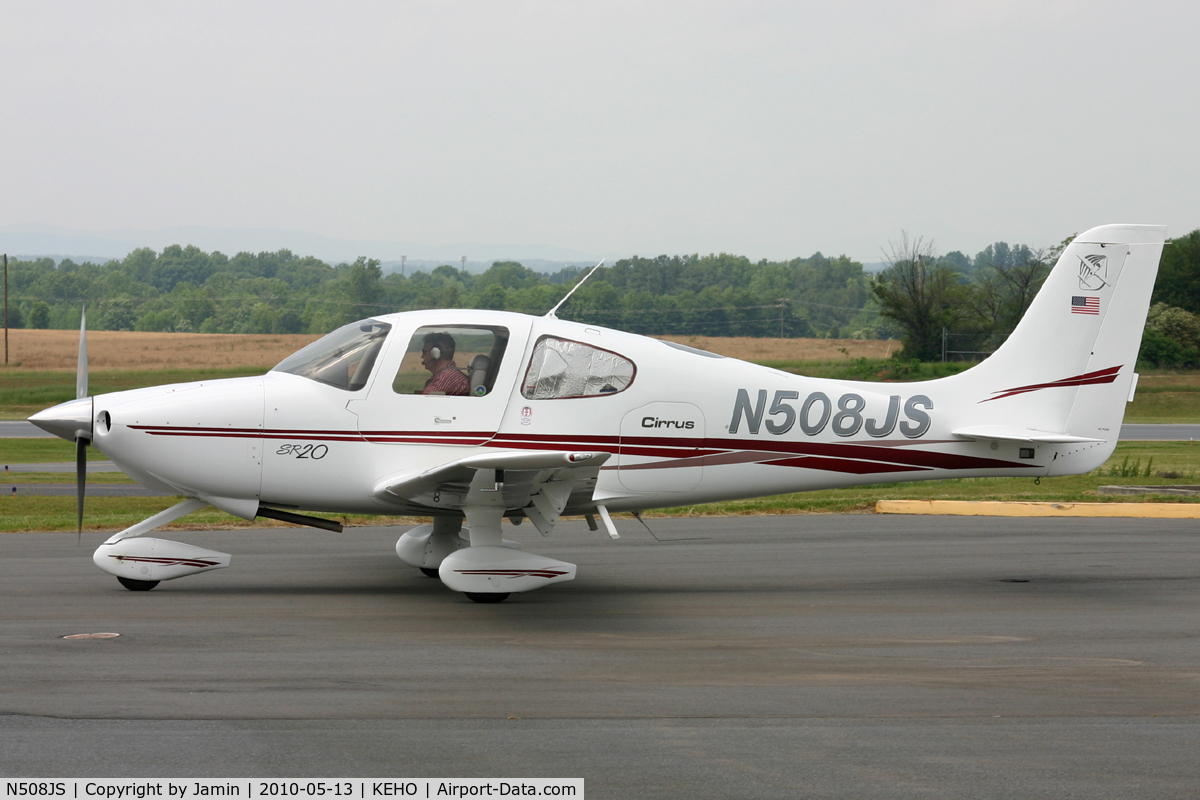 N508JS, 2002 Cirrus SR20 C/N 1170, Sporting the characteristic long exhaust stacks.