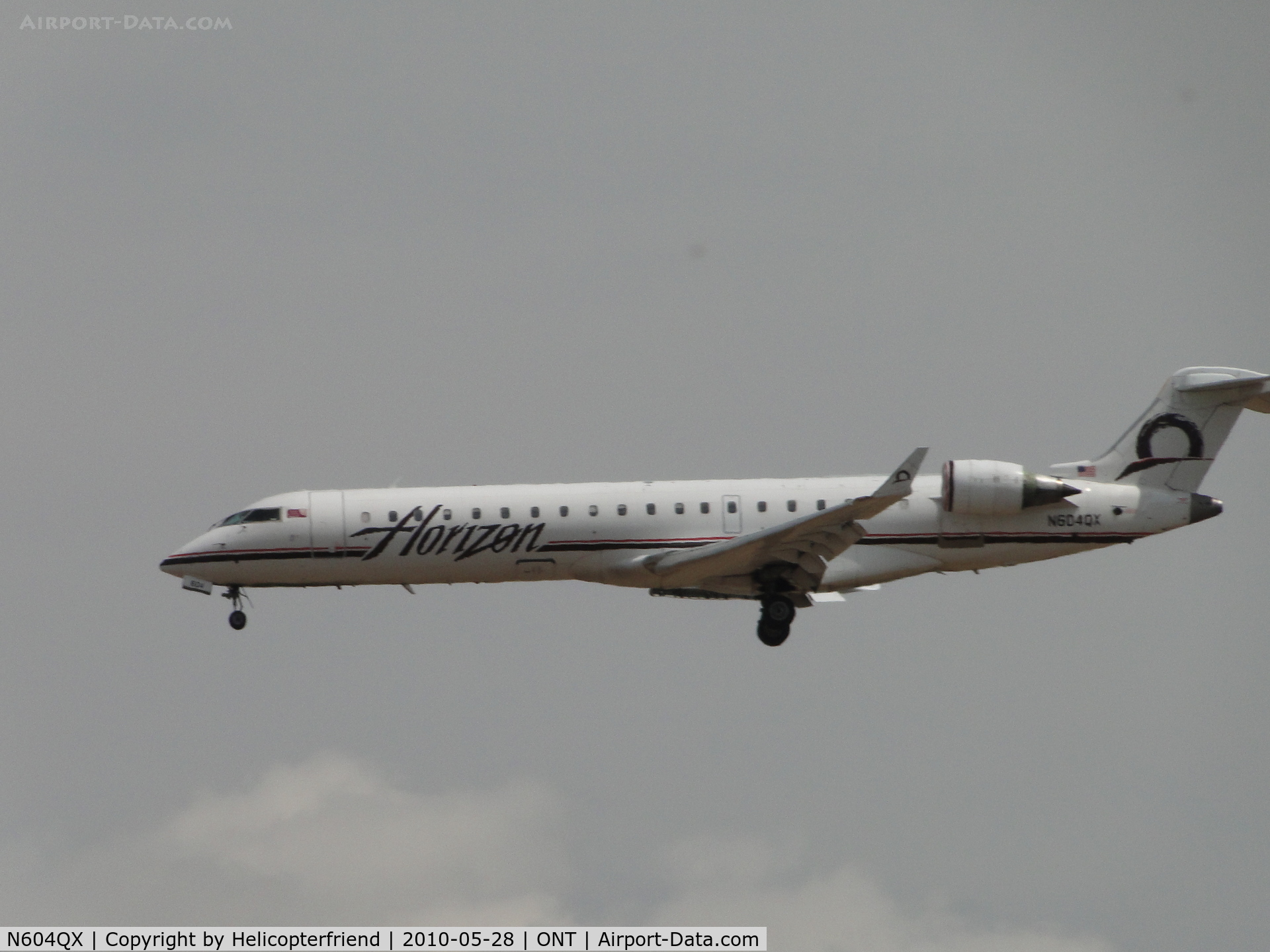 N604QX, 2001 Bombardier CRJ-701 (CL-600-2C10) Regional Jet C/N 10019, On final to 26R