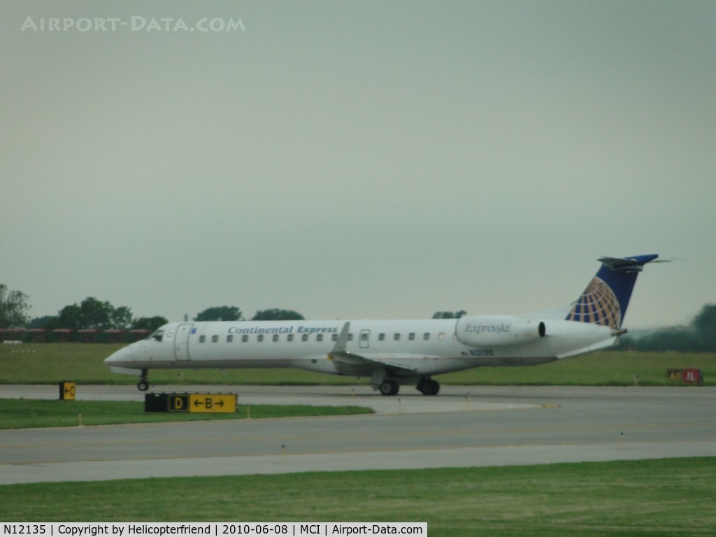 N12135, 2003 Embraer ERJ-145XR (EMB-145XR) C/N 145718, Taxiing onto runway 9