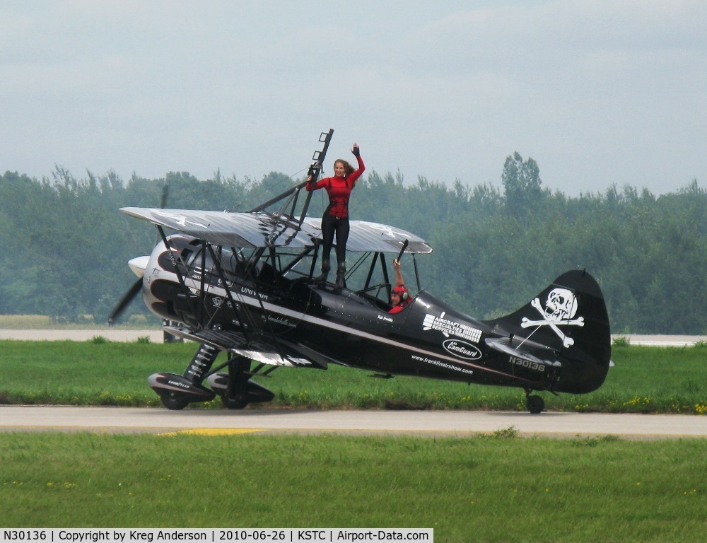 N30136, 1980 Waco UPF-7 C/N 5533, Kyle and Amanda Franklin taxiing back to the staging area after their Pirated Skies act at The Great Minnesota Airshow 2010.