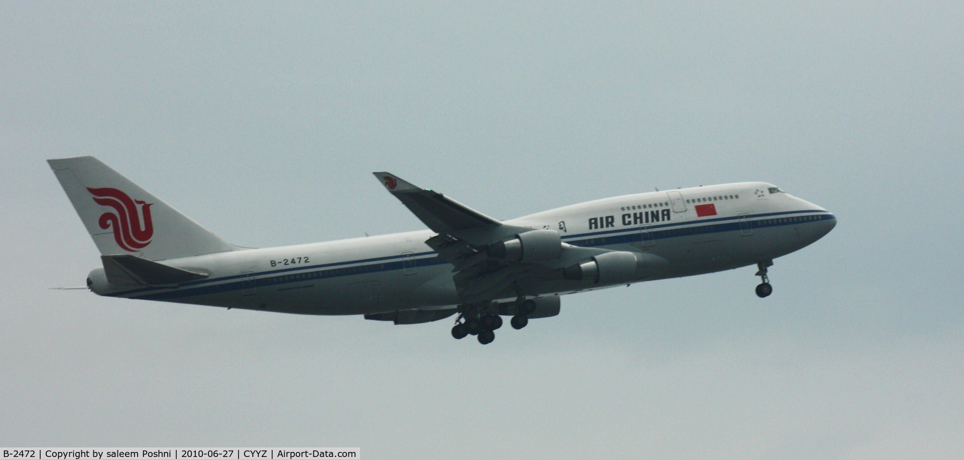 B-2472, 2000 Boeing 747-4J6 C/N 30158, Air China Flight 001 departing CYYZ with Chinese president Hu Jin Tao following the G20 meeting.  Heavy rain and poor visibility on that day.