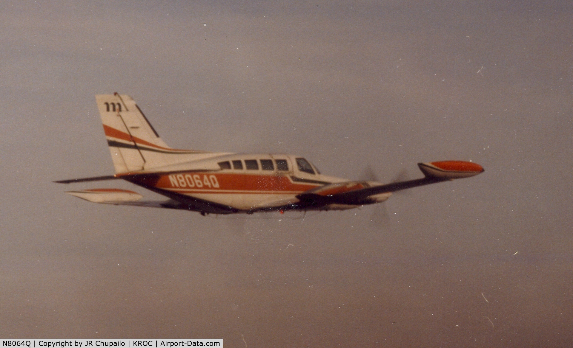 N8064Q, Cessna 402B C/N 402B0400, N8064Q airborne over upstate New York, 1982.