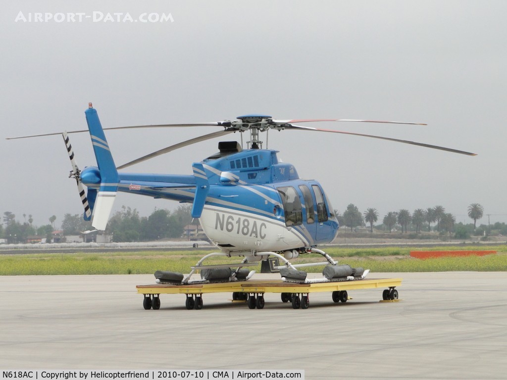 N618AC, 1997 Bell 407 C/N 53153, Parked on it's dolly facing the airstrip