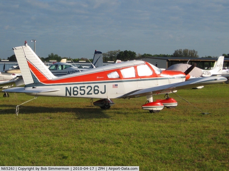 N6526J, 1968 Piper PA-28-180 C/N 28-4964, Tied down in the grass at Zephyrhills, Florida during Sun N Fun week.