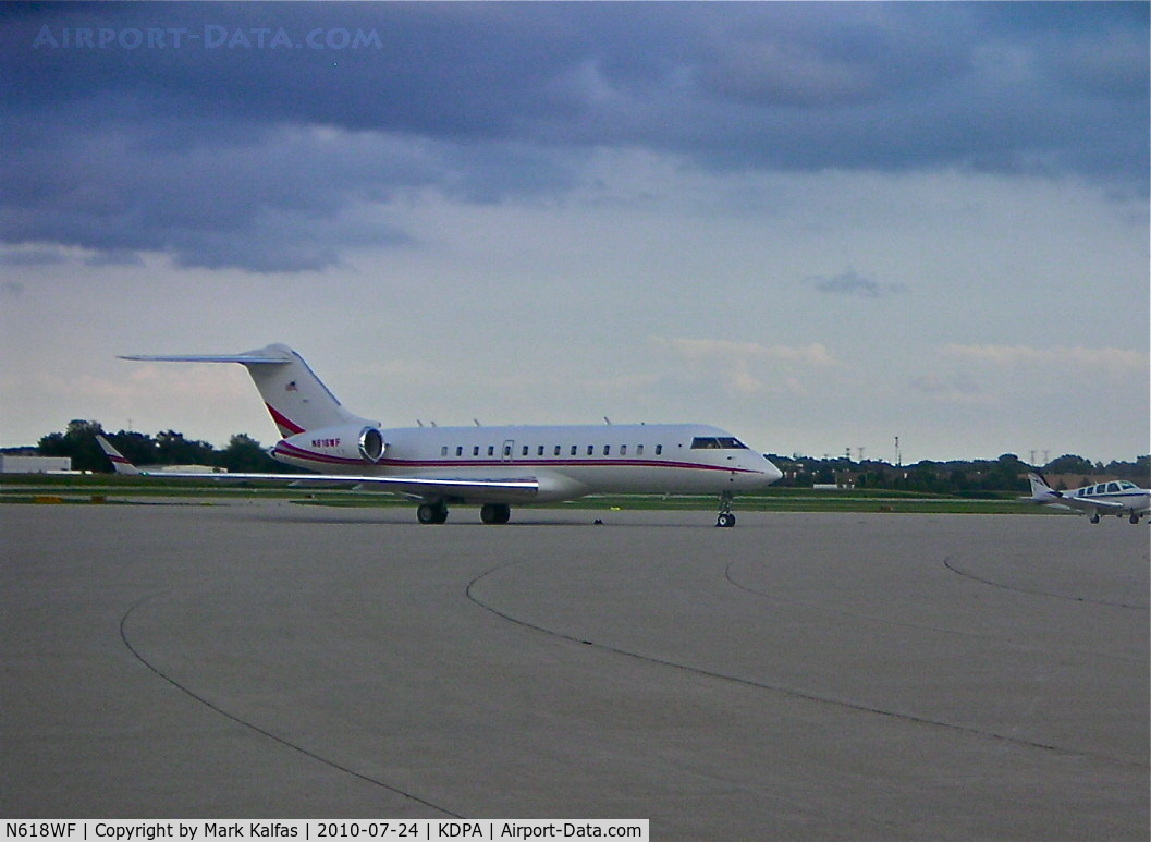 N618WF, 1999 Bombardier BD-700-1A10 Global Express C/N 9005, N618WF INC, 1999 Bombardier BD-700-1A10 on the ramp at KDPA preparing for a long overnighter to EHAM (Amsterdam Schiphol).