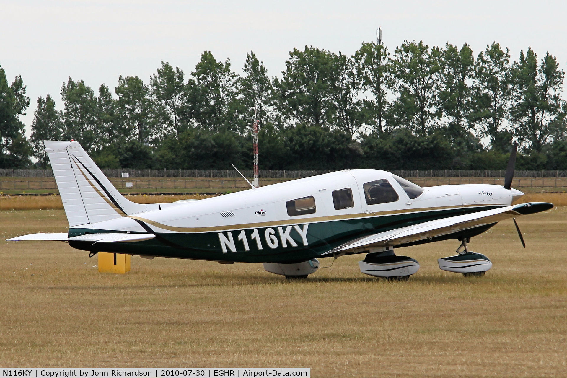 N116KY, 2004 Piper PA-32-301FT 6X Saratoga Saratoga C/N 3232021, Parked at Goodwood