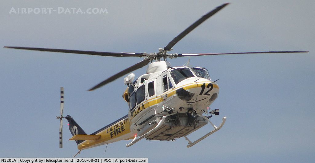 N120LA, 2007 Bell 412EP C/N 36455, Air taxiing between runways 26R and 8L enroute to LACO helipad